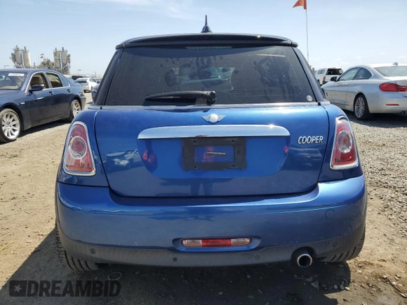 2012 MINI Hardtop z VIN WMWSU3C5XCT368997, wystawiony jako Copart lot #54622735 z przebiegiem 104 261 mil mil oraz Szkoda całkowita • Salvage title. Historia ofert i sprzedaży dostępna na DreamBid. Obrazek 6.