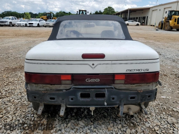 1993 Geo Metro z VIN JG1MR3362PK209644, wystawiony jako Copart lot #58749655 z przebiegiem 149 163 mil mil oraz Szkoda całkowita • Salvage title. Historia ofert i sprzedaży dostępna na DreamBid. Obrazek 6.