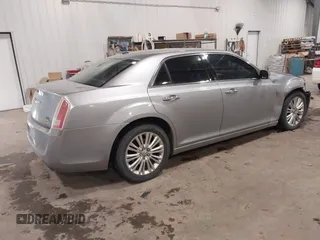 2013 Chrysler 300 with VIN 2C3CCAKT6DH645307, listed as a IAAI auction lot 41512163 with 154,225 mi miles. Bid and sale history available at carsss.com. Image 4.