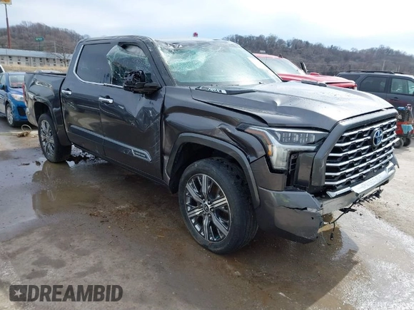 2022 Toyota Tundra Capstone Hybrid with VIN 5TFVC5DB6NX005465, listed as a IAAI auction lot 41589222 with 28,452 mi miles and . Bid and sale history available at DreamBid. Image 1.