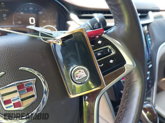 2014 Cadillac XTS Premium with VIN 2G61P5S33E9157607, listed as a IAAI auction lot 42004612 with 111,047 mi miles and . Bid and sale history available at DreamBid. Image 11.