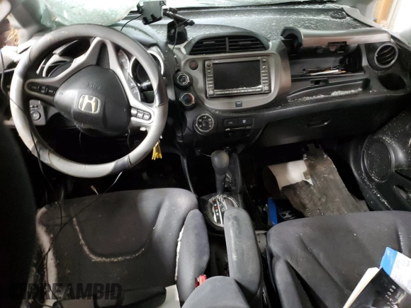 2009 Honda Fit Sport z VIN JHMGE88669S007350, wystawiony jako Copart lot #45591215 z przebiegiem Nie podano mil oraz Nie do naprawy • Non repairable. Historia ofert i sprzedaży dostępna na DreamBid. Obrazek 8.