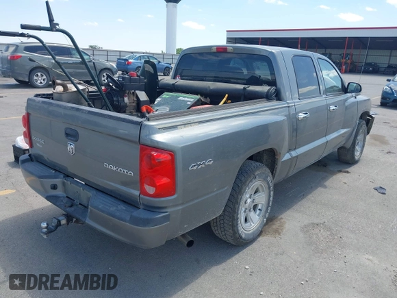 2010 Dodge Dakota Bighorn/Lonestar z VIN 1D7CW3GK4AS264452, wystawiony jako IAAI lot #42281697 z przebiegiem 106 599 mil mil oraz . Historia ofert i sprzedaży dostępna na DreamBid. Obrazek 4.