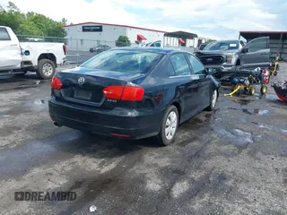 2013 Volkswagen Jetta SE z VIN 3VWDX7AJ4DM396477, wystawiony jako IAAI lot #42659959 z przebiegiem 115 833 mil mil oraz . Historia ofert i sprzedaży dostępna na DreamBid. Obrazek 4.