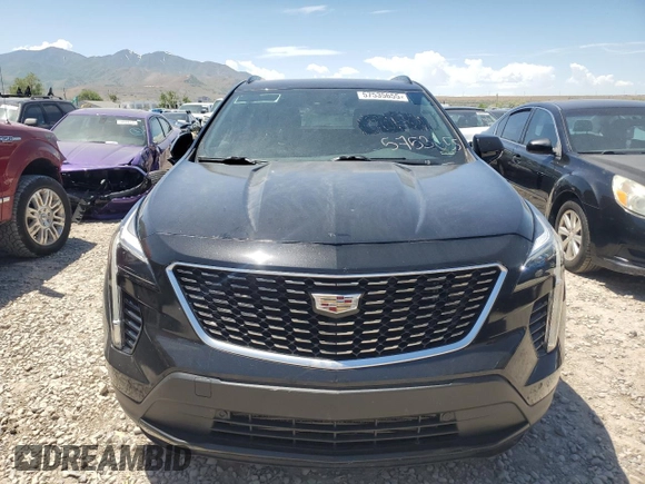 2019 Cadillac XT4 AWD Sport with VIN 1GYFZFR47KF152344, listed as a Copart auction lot 57535655 with 70,107 mi miles and Salvage title. Bid and sale history available at DreamBid. Image 5.