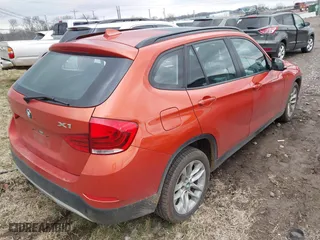 2015 BMW X1 xDrive28i with VIN WBAVL1C50FVY41206, listed as a IAAI auction lot 41508136 with 102,725 mi miles. Bid and sale history available at carsss.com. Image 4.