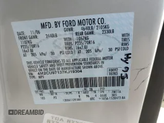 2007 Mercury Mariner Premier z VIN 4M2CU97137KJ19304, wystawiony jako Copart lot #46072225 z przebiegiem 175 829 mil mil oraz Szkoda całkowita • Salvage title. Historia ofert i sprzedaży dostępna na DreamBid. Obrazek 14.