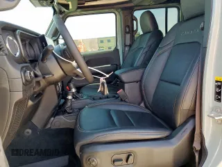 2024 Jeep Wrangler Sahara with VIN 1C4PJXEN6RW106911, listed as a Copart auction lot 58937945 with 13,948 mi miles and Salvage title. Bid and sale history available at DreamBid. Image 7.