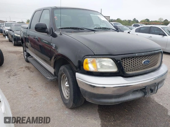 2003 Ford F-150 XLT with VIN 1FTRW07613KD14135, listed as a IAAI auction lot 41879756 with 197,515 mi miles. Bid and sale history available at carsss.com. Image 1.