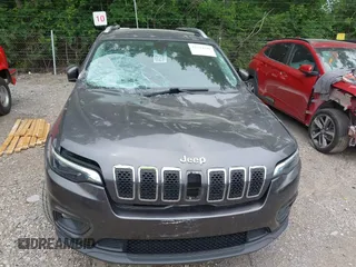 2020 Jeep Cherokee Latitude Plus with VIN 1C4PJMLBXLD580130, listed as a IAAI auction lot 42344240 with 82,814 mi miles and . Bid and sale history available at DreamBid. Image 12.