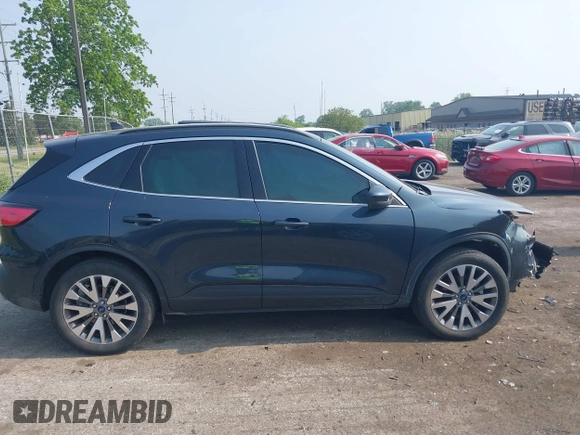 2022 Ford Escape Titanium with VIN 1FMCU9J93NUB50196, listed as a IAAI auction lot 42420209 with 22,210 mi miles and . Bid and sale history available at DreamBid. Image 14.