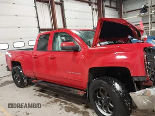 2018 Chevrolet Silverado 1500 LT with VIN 1GCRCREH4JZ164236, listed as a IAAI auction lot 41394225 with 64,639 mi miles and . Bid and sale history available at DreamBid. Image 14.