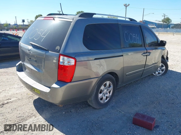 2010 Kia Sedona LX with VIN KNDMG4C34A6357531, listed as a IAAI auction lot 40493225 with 174,529 mi miles. Bid and sale history available at carsss.com. Image 4.