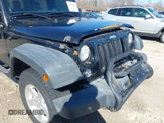 2014 Jeep Wrangler Sport with VIN 1C4AJWAGXEL319749, listed as a IAAI auction lot 41752779 with 140,045 mi miles and . Bid and sale history available at DreamBid. Image 17.