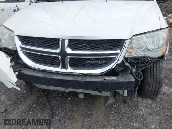 2012 Dodge Grand Caravan SE with VIN 2C4RDGBG9CR232038, listed as a IAAI auction lot 41823766 with 77,468 mi miles and . Bid and sale history available at DreamBid. Image 12.