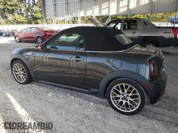 2015 MINI Roadster S z VIN WMWSY3C59FT566785, wystawiony jako Copart lot #73574064 z przebiegiem 96 623 mil mil oraz Tytuł czysty. Historia ofert i sprzedaży dostępna na DreamBid. Obrazek 2.