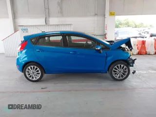 2014 Ford Fiesta SE with VIN 3FADP4EJ7EM204438, listed as a IAAI auction lot 42098291 with 184,930 mi miles and . Bid and sale history available at DreamBid. Image 14.