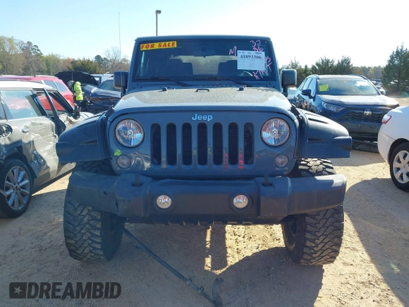 2015 Jeep Wrangler Sport with VIN 1C4AJWAG0FL591213, listed as a IAAI auction lot 41893306 with 107,807 mi miles and . Bid and sale history available at DreamBid. Image 12.