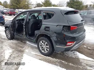 2019 Hyundai Santa Fe SE with VIN 5NMS2CAD9KH003200, listed as a IAAI auction lot 41541423 with 91,913 mi miles. Bid and sale history available at carsss.com. Image 3.