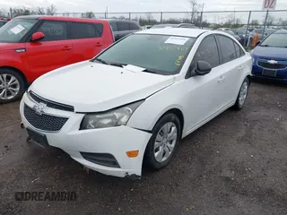 2014 Chevrolet Cruze LS with VIN 1G1PA5SH0E7145168, listed as a IAAI auction lot 41957410 with 151,422 mi miles and . Bid and sale history available at DreamBid. Image 2.