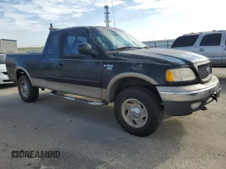 2001 Ford F-150 XL with VIN 1FTRX18L01NA29591, listed as a Copart auction lot 50591035 with 250,345 mi miles and Salvage Title. Bid and sale history available at carsss.com. Image 4.