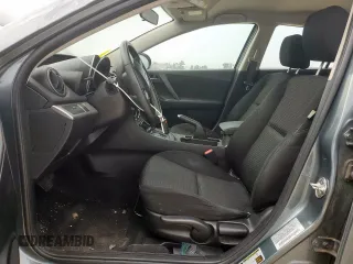 2012 Mazda 3 i Touring z VIN JM1BL1L70C1580749, wystawiony jako Copart lot #58774145 z przebiegiem 147 890 mil mil oraz Szkoda całkowita • Salvage title. Historia ofert i sprzedaży dostępna na DreamBid. Obrazek 7.
