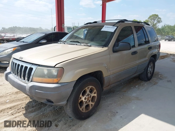 2001 Jeep Grand Cherokee Laredo with VIN 1J4GX48S81C589400, listed as a IAAI auction lot 42091559 with 219,698 mi miles and . Bid and sale history available at DreamBid. Image 2.