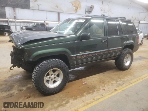 1995 Jeep Grand Cherokee Limited z VIN 1J4GZ78S7SC766726, wystawiony jako Copart lot #84909134 z przebiegiem 174 256 mil mil oraz Szkoda całkowita • Salvage title. Historia ofert i sprzedaży dostępna na DreamBid. Obrazek 1.