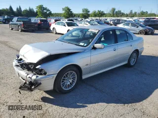 2002 BMW 5 Series 530i with VIN WBADT63472CH92160, listed as a Copart auction lot 65817125 with 29,393 mi miles and Salvage title. Bid and sale history available at DreamBid. Image 1.