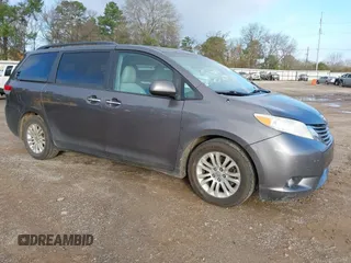2014 Toyota Sienna XLE with VIN 5TDYK3DC1ES509800, listed as a IAAI auction lot 41187555 with 217,243 mi miles and . Bid and sale history available at DreamBid. Image 1.
