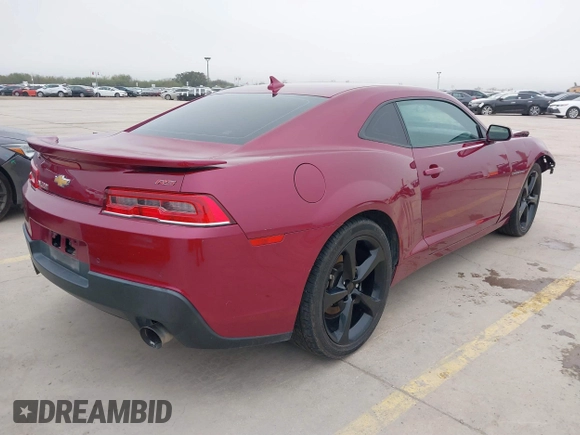 2014 Chevrolet Camaro LT z VIN 2G1FC1E3XE9317459, wystawiony jako IAAI lot #41168805 z przebiegiem 126 298 mil mil oraz . Historia ofert i sprzedaży dostępna na DreamBid. Obrazek 4.