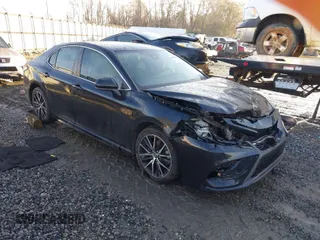 2021 Toyota Camry SE Nightshade with VIN 4T1G11AKXMU404242, listed as a IAAI auction lot 41444006 with 60,475 mi miles. Bid and sale history available at carsss.com. Image 1.