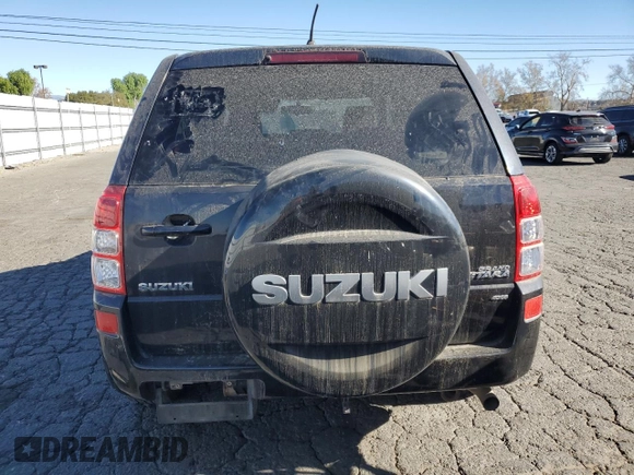 2009 Suzuki Grand Vitara z VIN JS3TD042294100363, wystawiony jako Copart lot #88151185 z przebiegiem 86 595 mil mil oraz Czysty tytuł • Clean title. Historia ofert i sprzedaży dostępna na DreamBid. Obrazek 6.