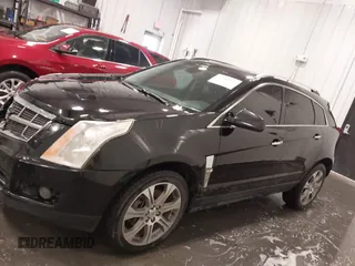 2012 Cadillac SRX Performance Collection z VIN 3GYFNBE30CS628660, wystawiony jako IAAI lot #42341993 z przebiegiem 249 922 mil mil oraz . Historia ofert i sprzedaży dostępna na DreamBid. Obrazek 14.