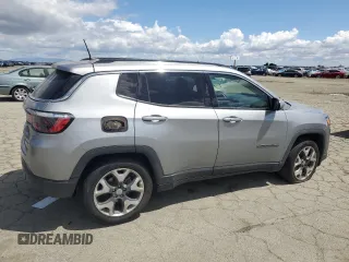 2020 Jeep Compass Limited with VIN 3C4NJCCB3LT128807, listed as a Copart auction lot 56673705 with 94,903 mi miles and Salvage title. Bid and sale history available at DreamBid. Image 3.