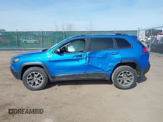 2021 Jeep Cherokee Trailhawk with VIN 1C4PJMBX4MD222987, listed as a IAAI auction lot 41771808 with 52,533 mi miles and . Bid and sale history available at DreamBid. Image 14.