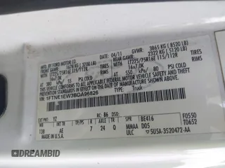 2011 Ford Econoline Cargo Commercial with VIN 1FTNE1EW3BDA96826, listed as a IAAI auction lot 41314002 with 408,264 mi miles and . Bid and sale history available at carsss.com. Image 9.