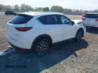 2018 Mazda CX-5 Grand Touring with VIN JM3KFBDM0J0404635, listed as a IAAI auction lot 41883068 with 71,178 mi miles. Bid and sale history available at carsss.com. Image 4.