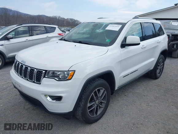 2018 Jeep Grand Cherokee Laredo z VIN 1C4RJFAG1JC479838, wystawiony jako IAAI lot #41903955 z przebiegiem 73 076 mil mil oraz . Historia ofert i sprzedaży dostępna na DreamBid. Obrazek 6.