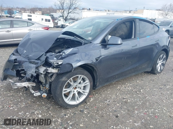 2023 Tesla Model Y Long Range with VIN 7SAYGDEE6PF824173, listed as a IAAI auction lot 41728613 with Not Provided miles and . Bid and sale history available at DreamBid. Image 2.