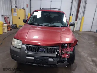 2003 Ford Escape XLT Popular 2 with VIN 1FMCU93173KA52806, listed as a IAAI auction lot 41696250 with 138,338 mi miles. Bid and sale history available at carsss.com. Image 12.