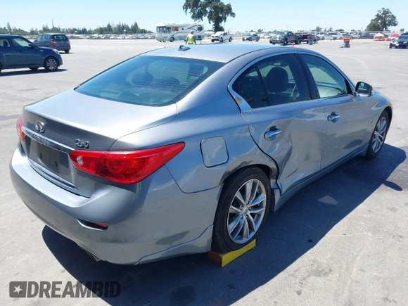 2014 Infiniti Q50 Premium with VIN JN1BV7AP0EM676949, listed as a IAAI auction lot 42684403 with 186,135 mi miles and . Bid and sale history available at DreamBid. Image 4.