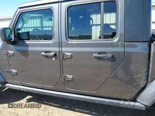 2023 Jeep Gladiator Sport S z VIN 1C6HJTAG2PL575276, wystawiony jako IAAI lot #42056473 z przebiegiem 17 043 mil mil oraz . Historia ofert i sprzedaży dostępna na DreamBid. Obrazek 14.