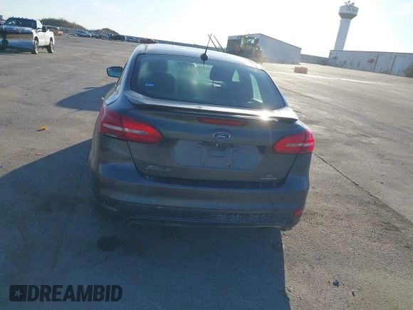 2016 Ford Focus SE with VIN 1FADP3F27GL374188, listed as a IAAI auction lot 41738121 with 125,229 mi miles. Bid and sale history available at carsss.com. Image 13.