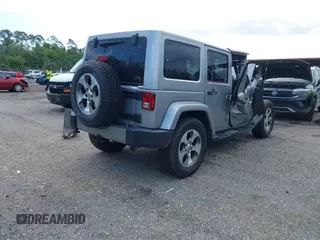 2016 Jeep Wrangler Unlimited Sahara with VIN 1C4BJWEG3GL240859, listed as a IAAI auction lot 42628937 with 103,378 mi miles and . Bid and sale history available at DreamBid. Image 4.