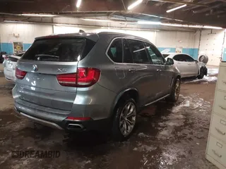2018 BMW X5 xDrive35i with VIN 5UXKR0C53J0Y03214, listed as a IAAI auction lot 41509082 with 92,552 mi miles. Bid and sale history available at carsss.com. Image 4.
