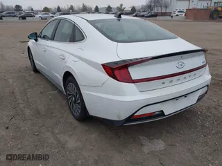 2021 Hyundai Sonata Hybrid SEL with VIN KMHL34JJ7MA032703, listed as a IAAI auction lot 41252575 with 22,067 mi miles. Bid and sale history available at carsss.com. Image 3.
