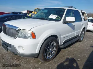 2004 Lincoln Navigator Luxury with VIN 5LMFU28R84LJ27797, listed as a IAAI auction lot 41101230 with 148,716 mi miles. Bid and sale history available at carsss.com. Image 18.