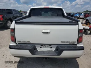 2012 Honda Ridgeline RTL with VIN 5FPYK1F56CB002709, listed as a Copart auction lot 62642495 with 116,416 mi miles and Salvage title. Bid and sale history available at DreamBid. Image 6.
