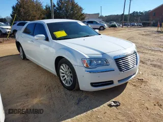 2014 Chrysler 300 with VIN 2C3CCAAGXEH377111, listed as a IAAI auction lot 41329879 with 147,680 mi miles. Bid and sale history available at carsss.com. Image 1.